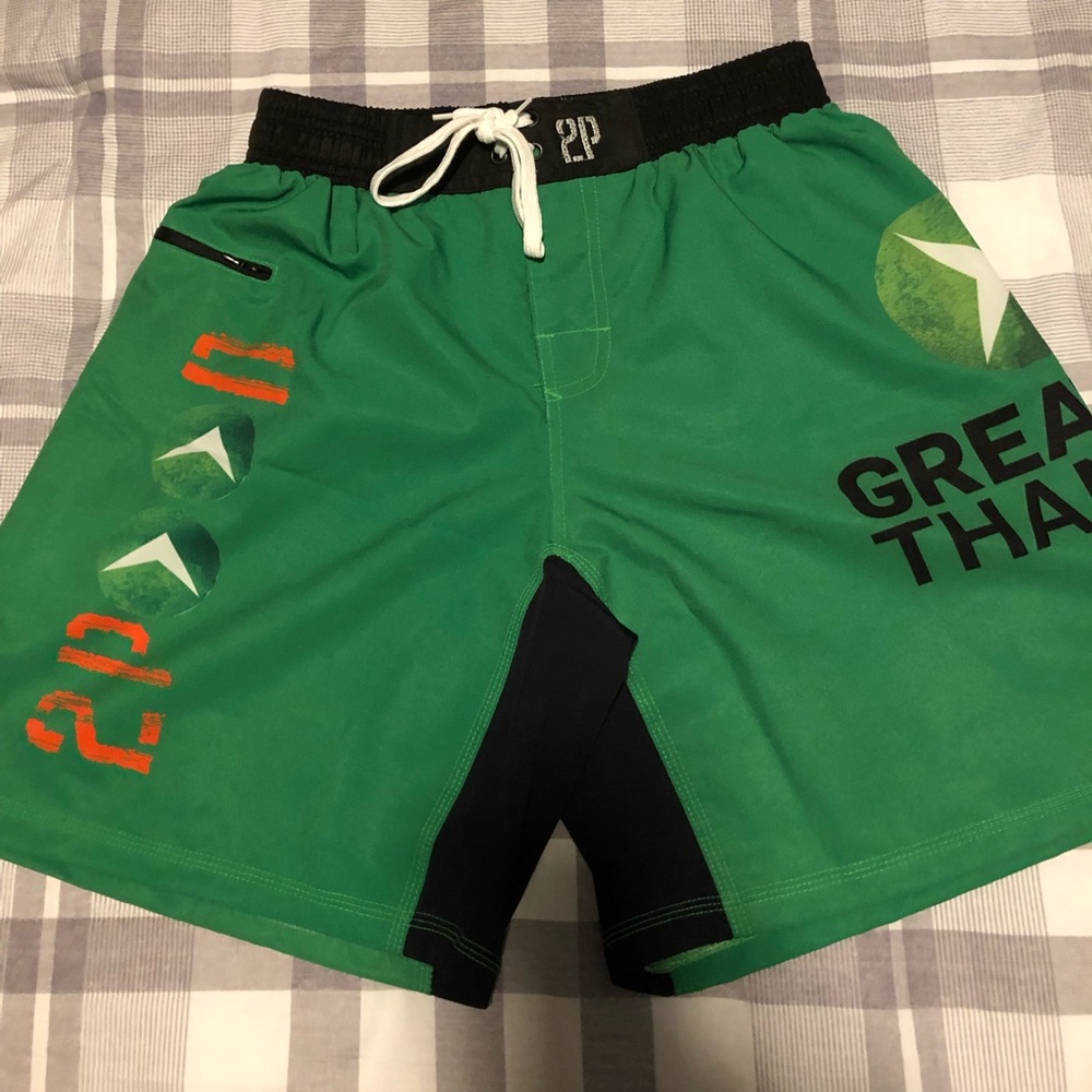 2Pood “Greater Than” sports drink shorts.